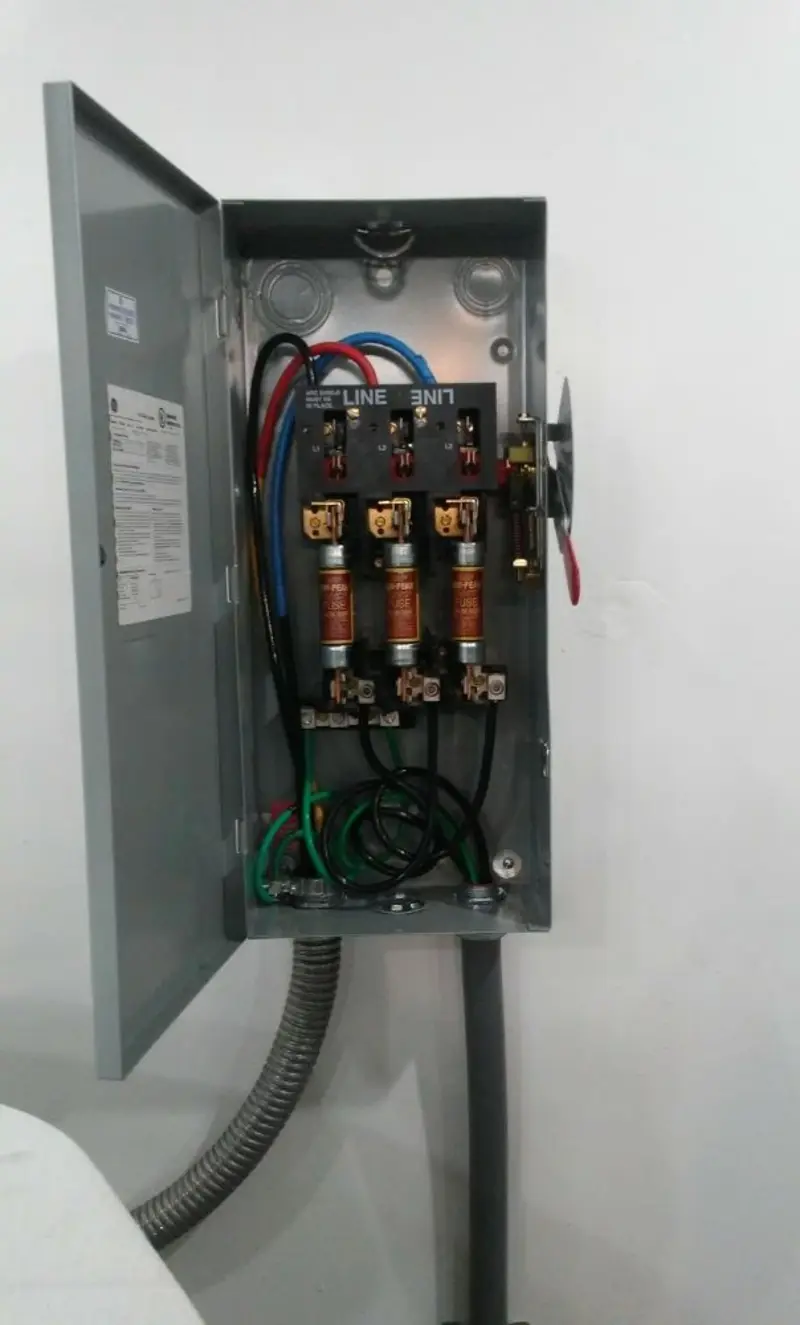 Three-phase disconnect switch installed for Smoke Detector Installation in Ashford